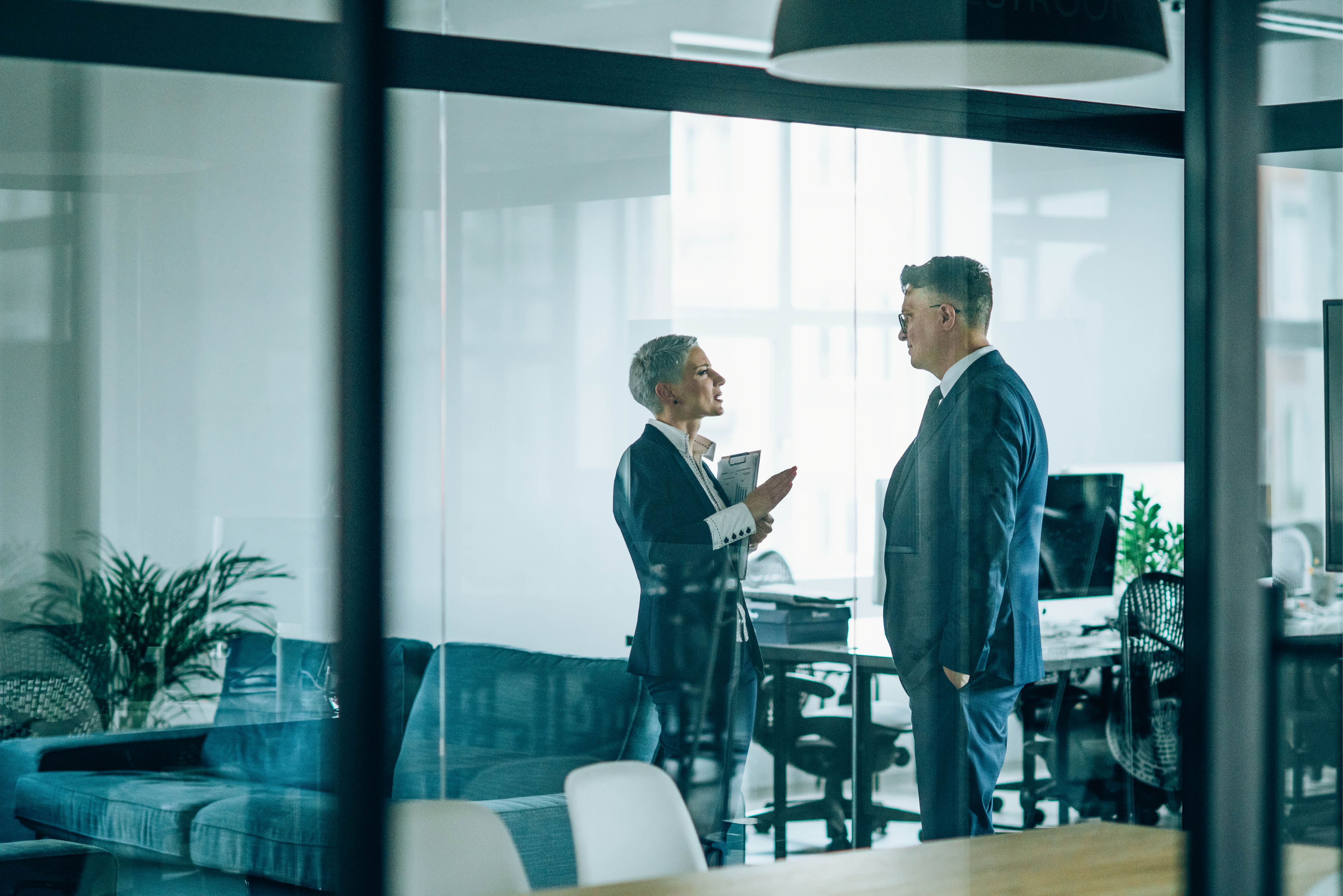 Business couple discussing important documentation