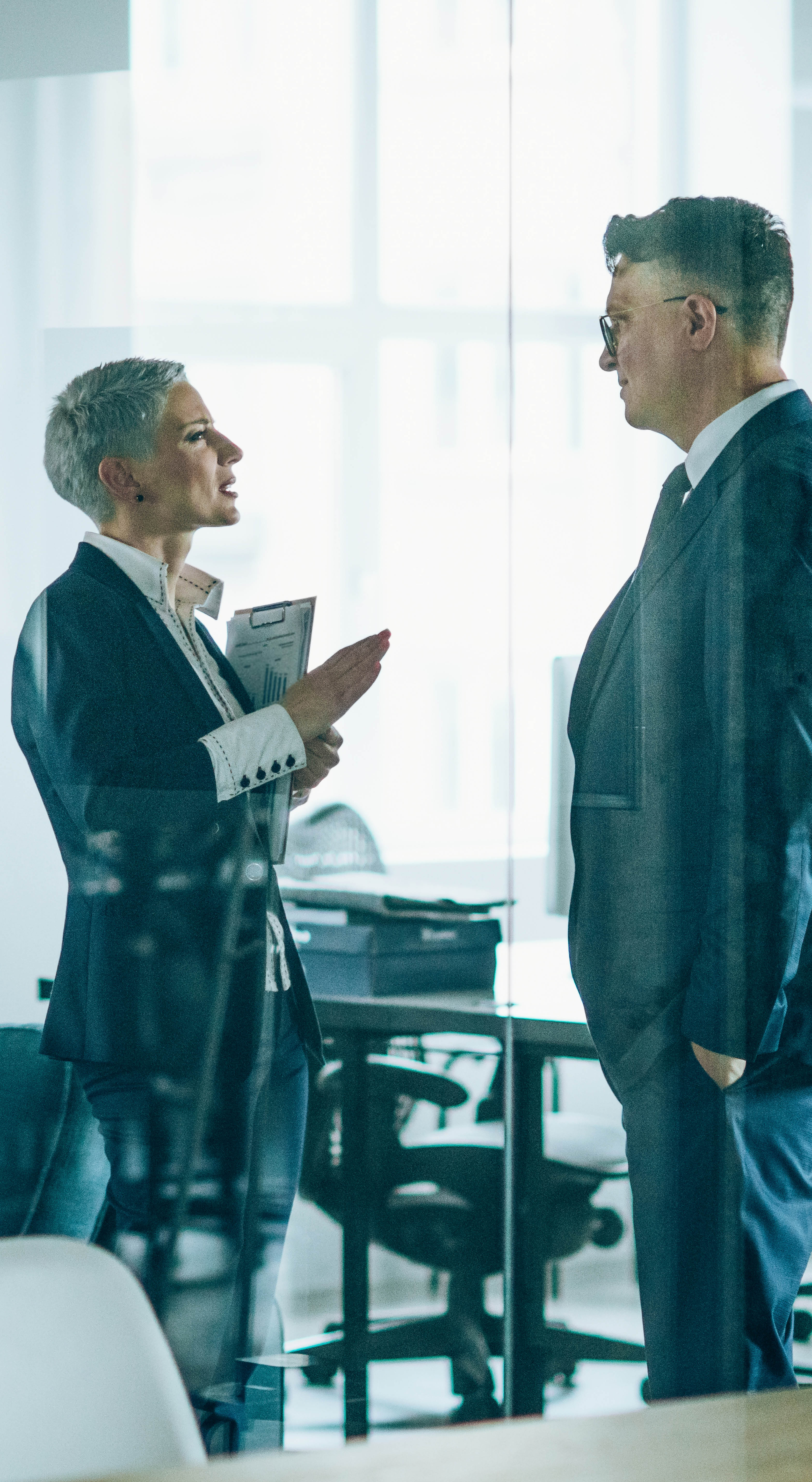 Business couple discussing important documentation