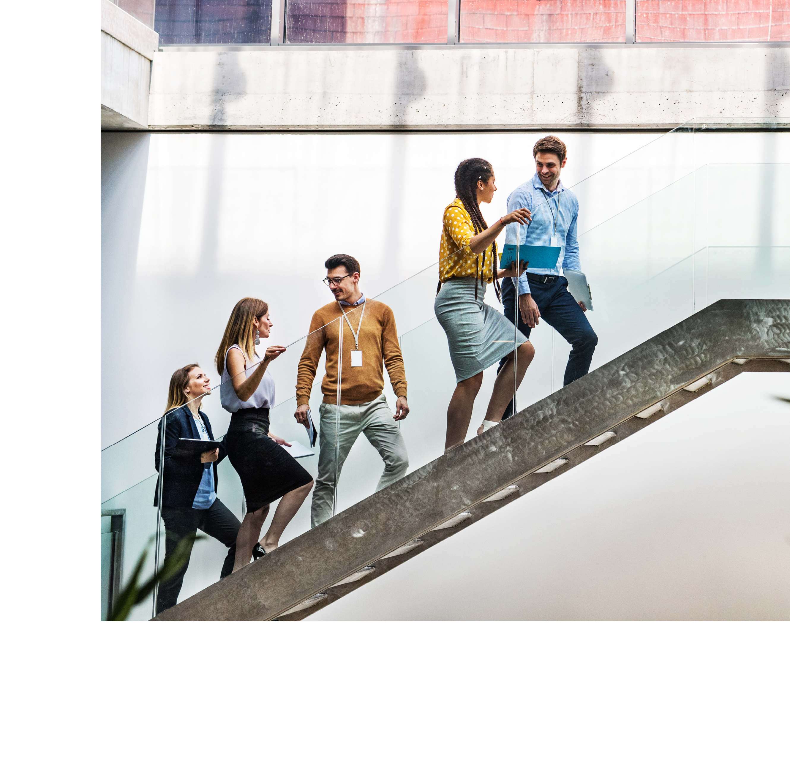 Attractive men and women after a training or a conference. Employee education concept.