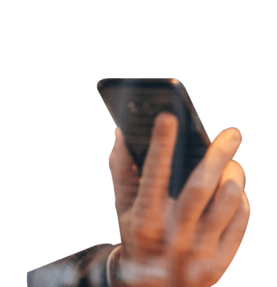 One handsome businessman in a suit drinking white wine and text messaging 