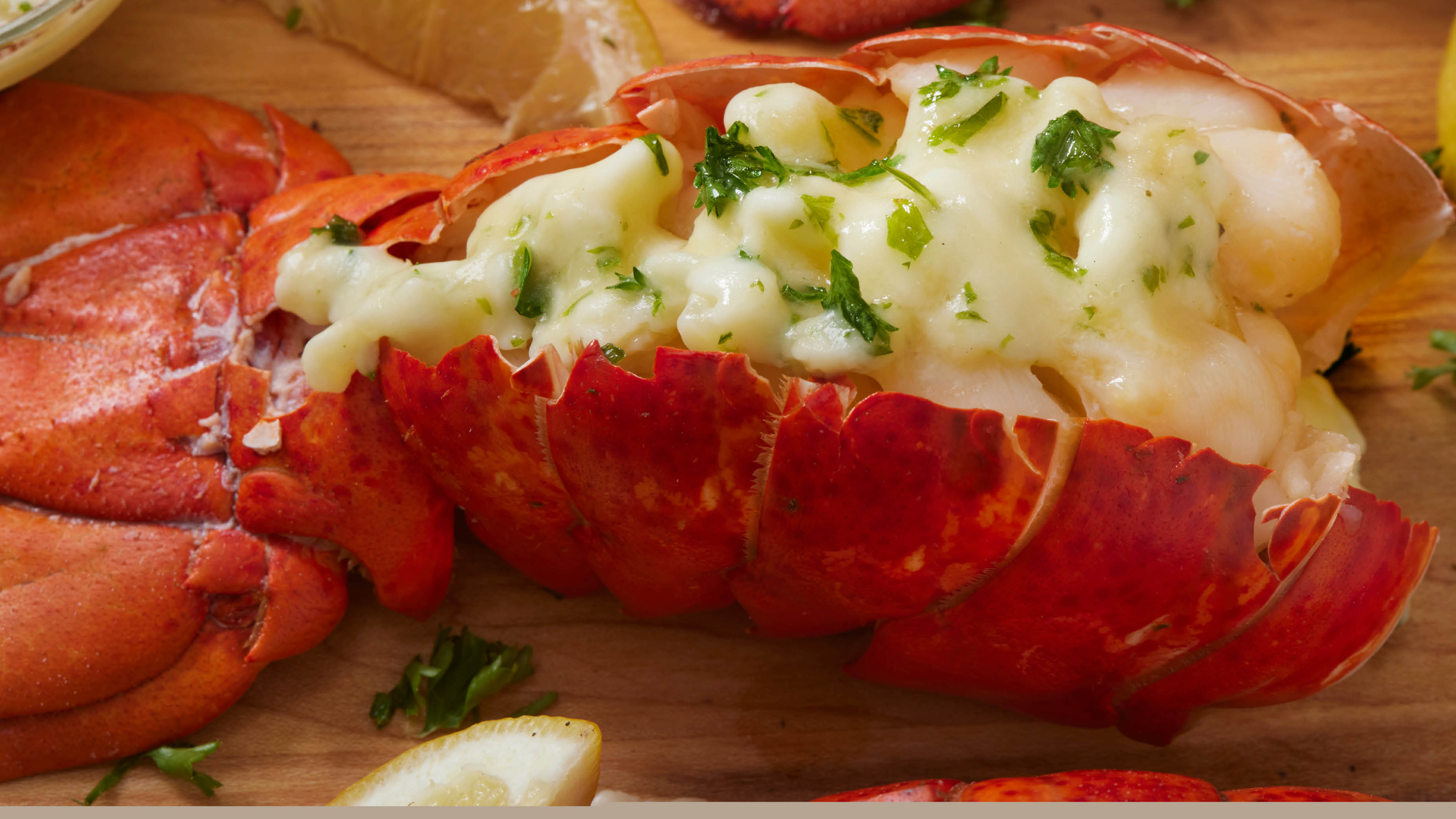 Steamed Lobster Tail with Roasted Garlic and Herb Butter