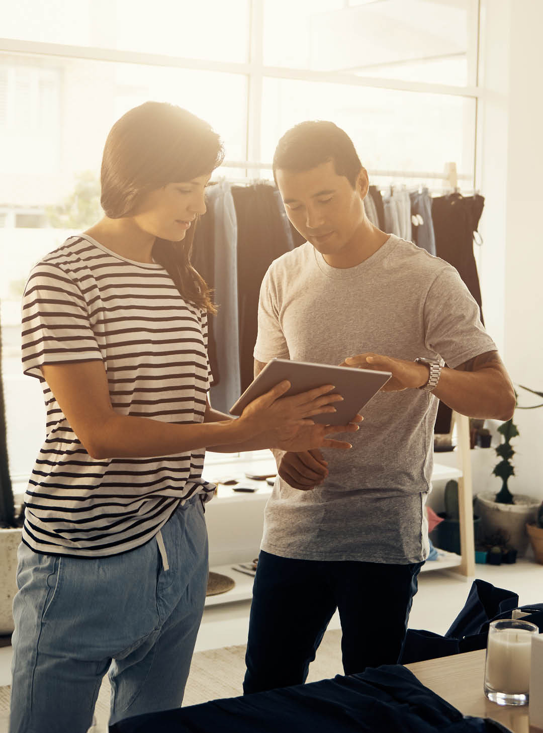 Shot of business partners working on a digital tablet togetherimage806285.jpg