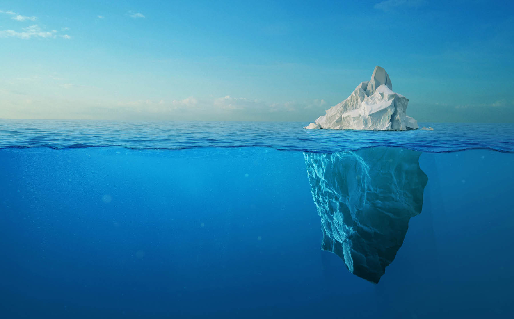 Iceberg With Above And Underwater View Taken In Greenland. Iceberg - Hidden Danger And Global Warming Concept. Iceberg illusion creative idea