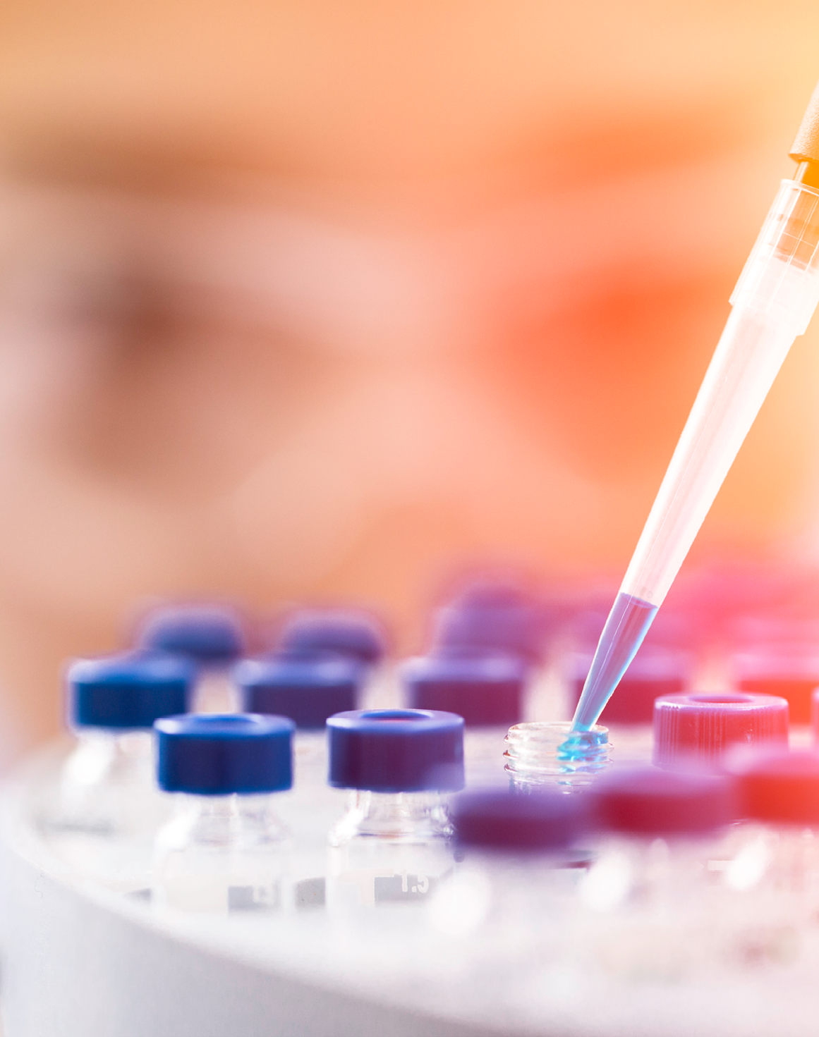 Female chemist at work in laboratory.