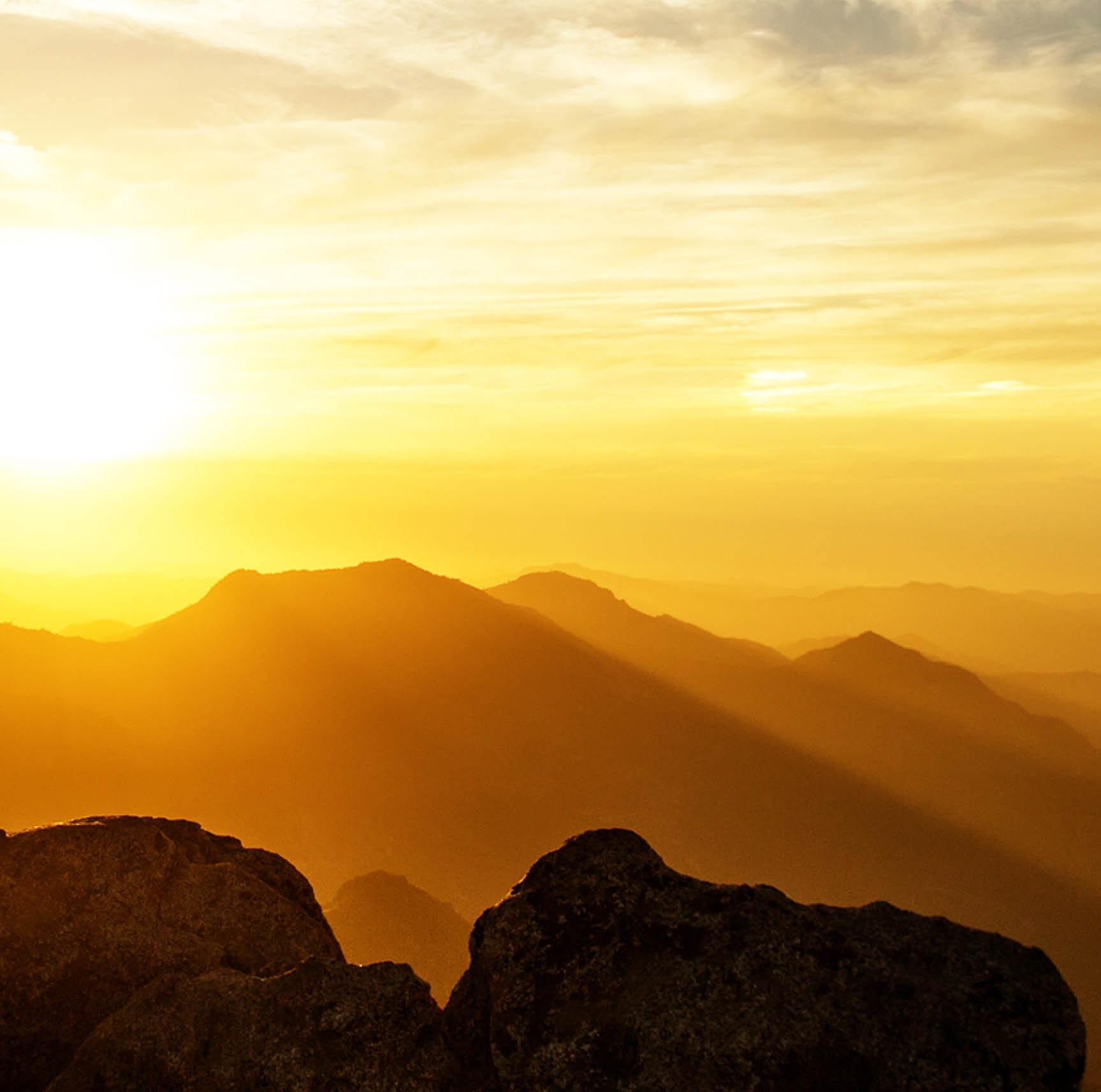 Hiker meets the sunset on the Moro rock in Sequoia national park, California, USA.