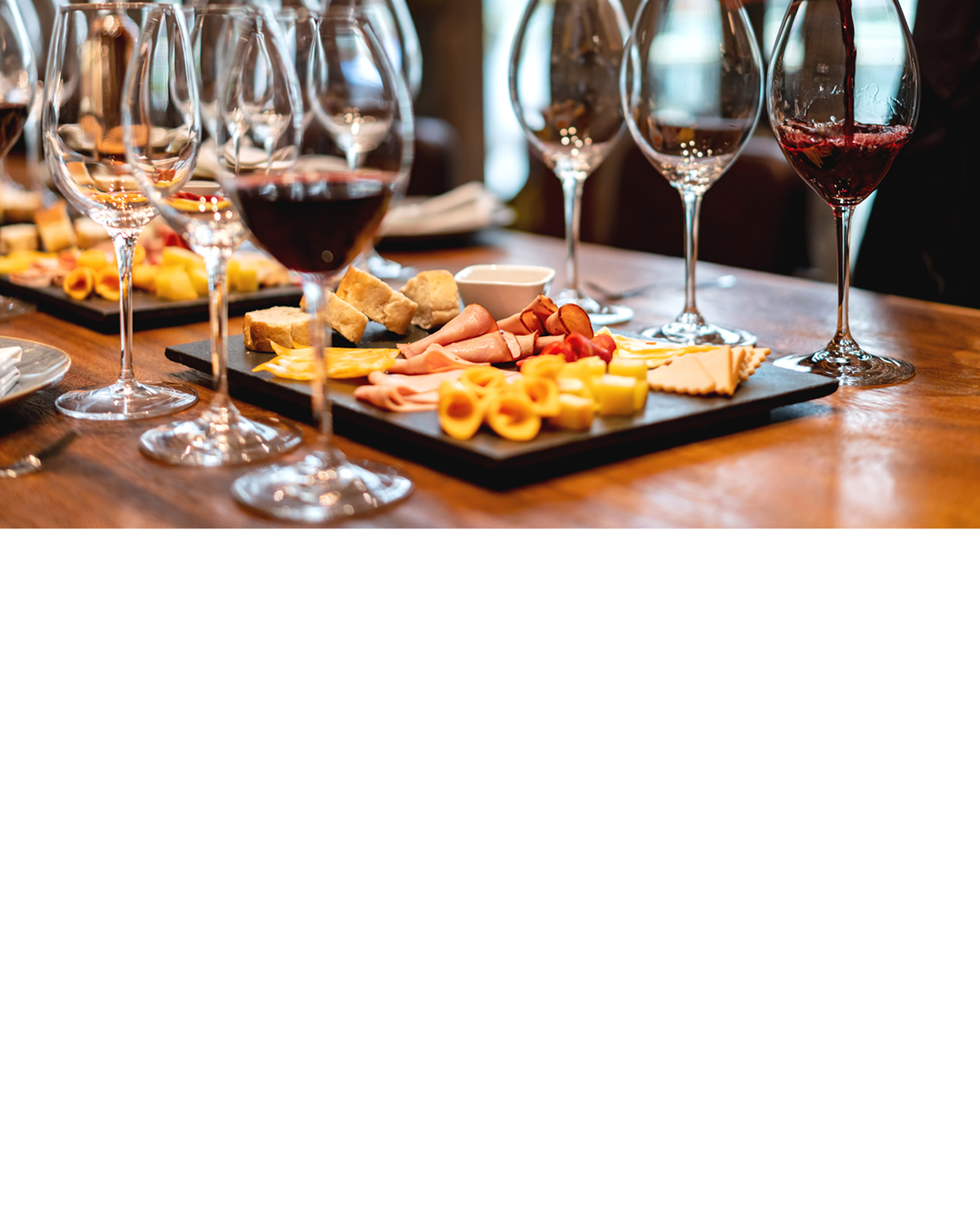 Close-up on a sommelier serving glasses of winetasting event