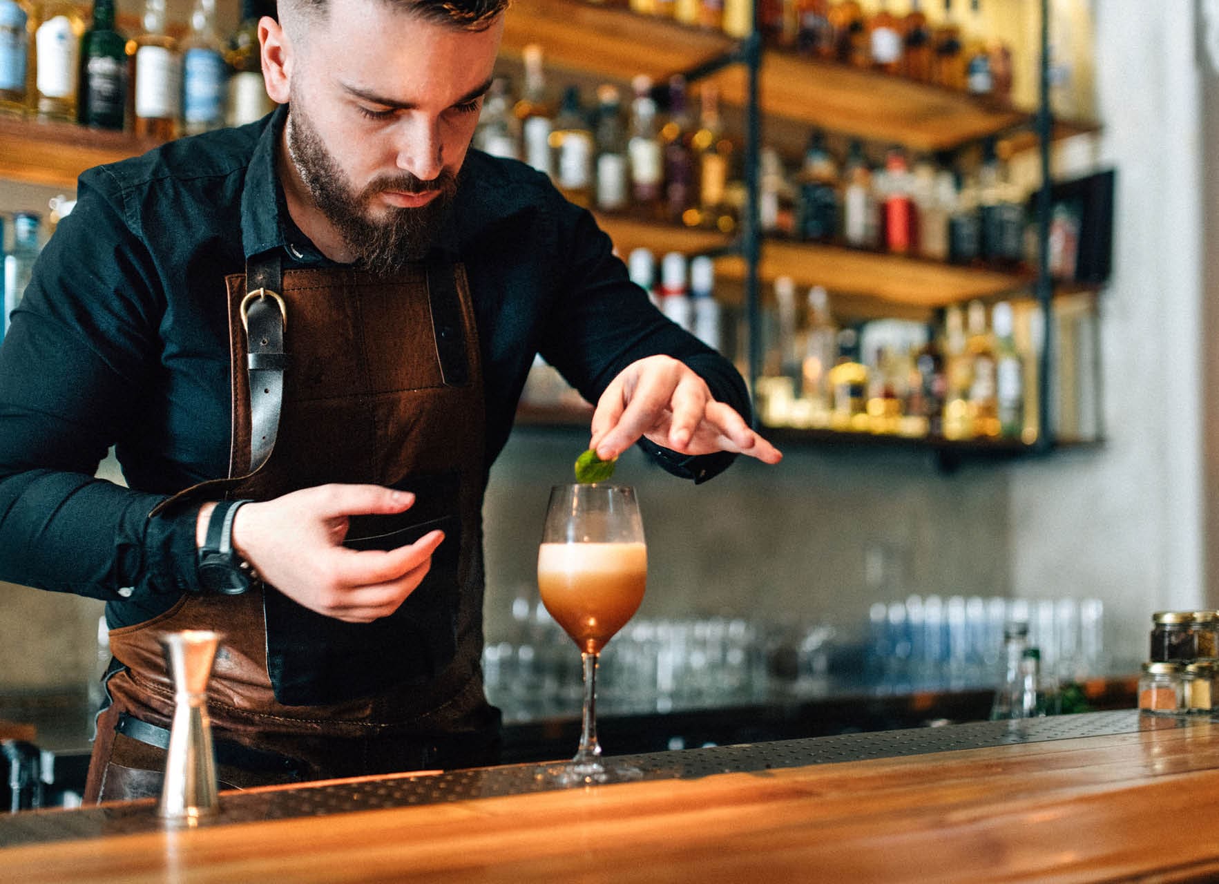 Bartender preparing cocktails